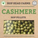 A close-up of Cashmere hop pellets with "Hop Head Farms" displayed at the top and logos on either side.