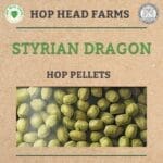 Label for Styrian Dragon hop pellets by Hop Head Farms. The label includes logos, green text, and an image of green hop pellets on a textured brown background.